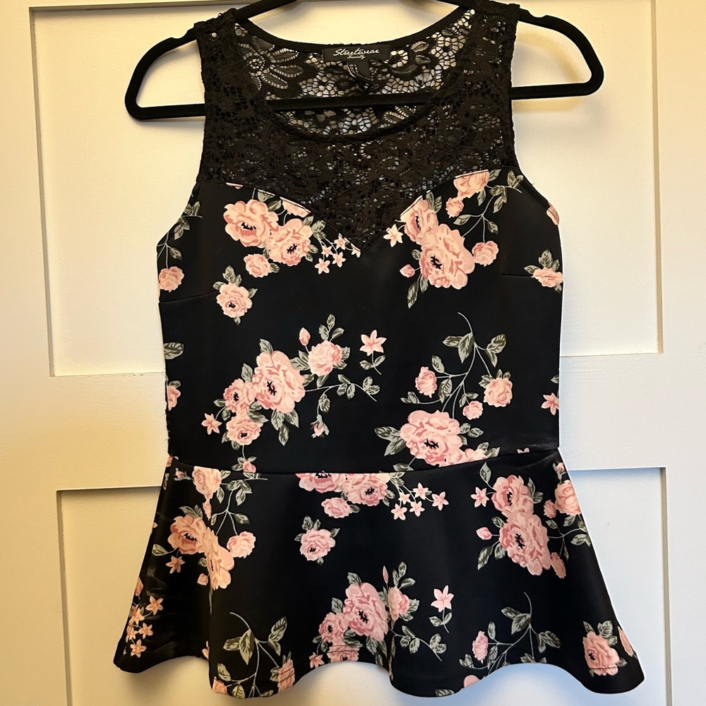 Floral peplum top with lace back